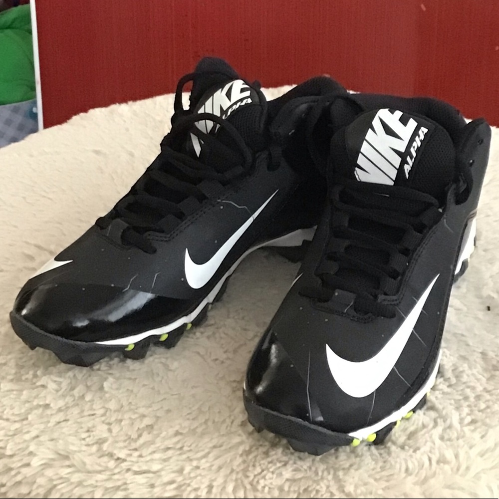 - Nike football cleats NIB